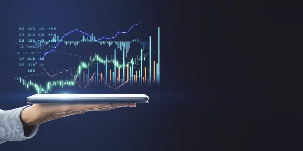 Diagrammer og markedsanalyser på en tablet som en visuel forklaring for nybegyndere